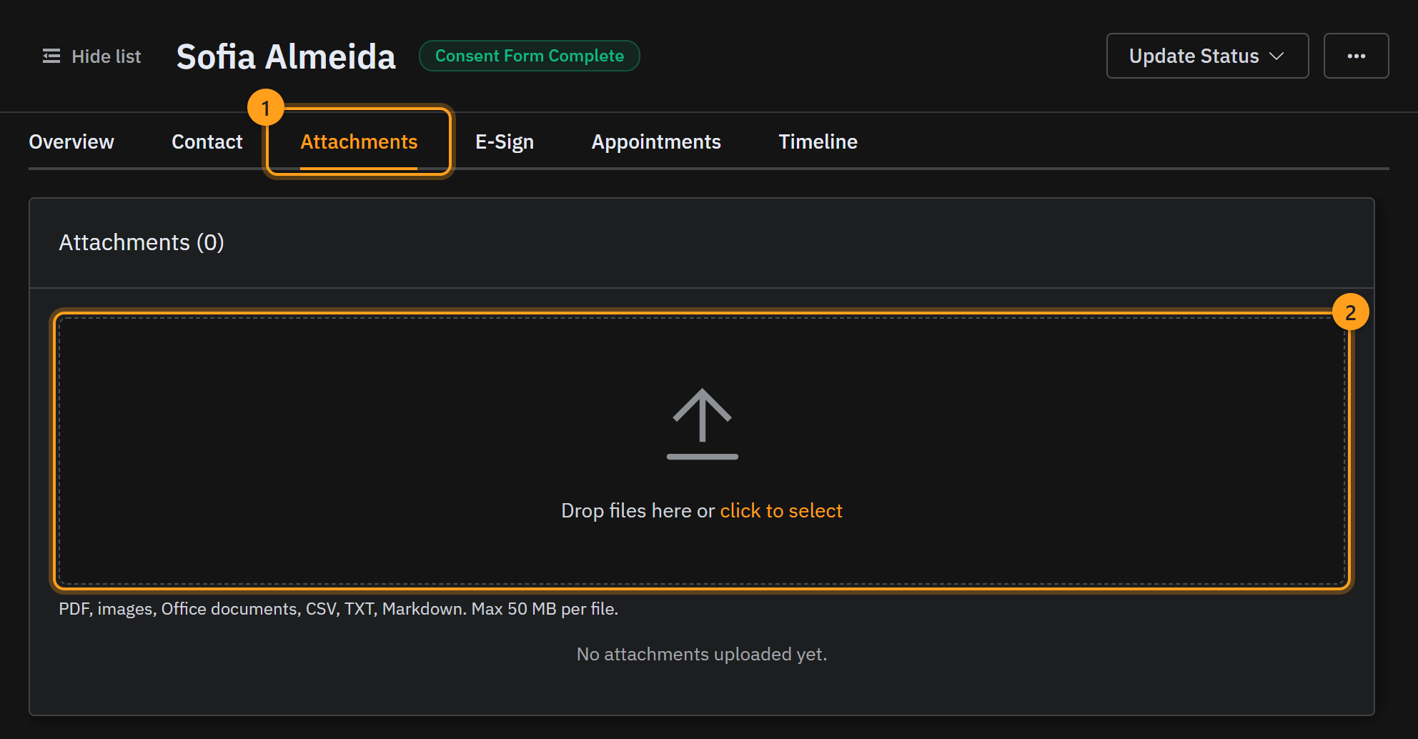 The Attachments tab (1) with the upload area where you drop or click to select the finished file (2)