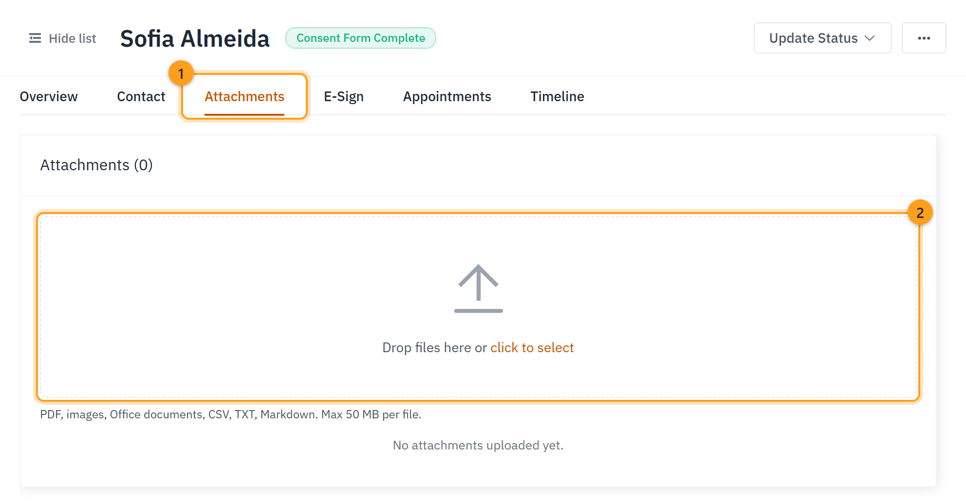 The Attachments tab (1) with the upload area where you drop or click to select the finished file (2)